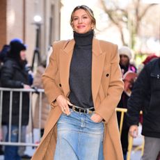 Gisele Bündchen wears a denim midi skirt in New York City