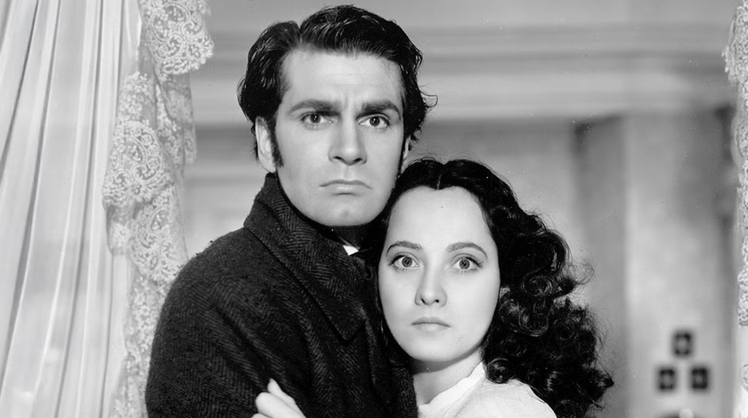 A black and white image of Merle Oberon and Laurence Olivier in Wuthering Heights