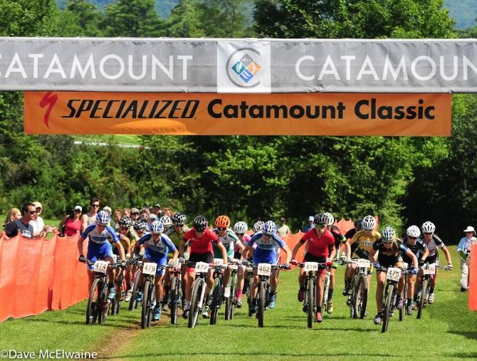 The Pro Women starting on a long grassy part of the course