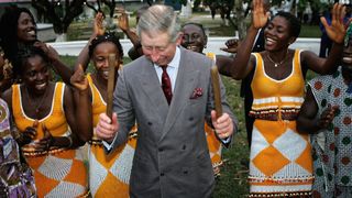 King Charles most memorable moments - Prince Charles plays drums with the Sierra Leone National Band Toupe