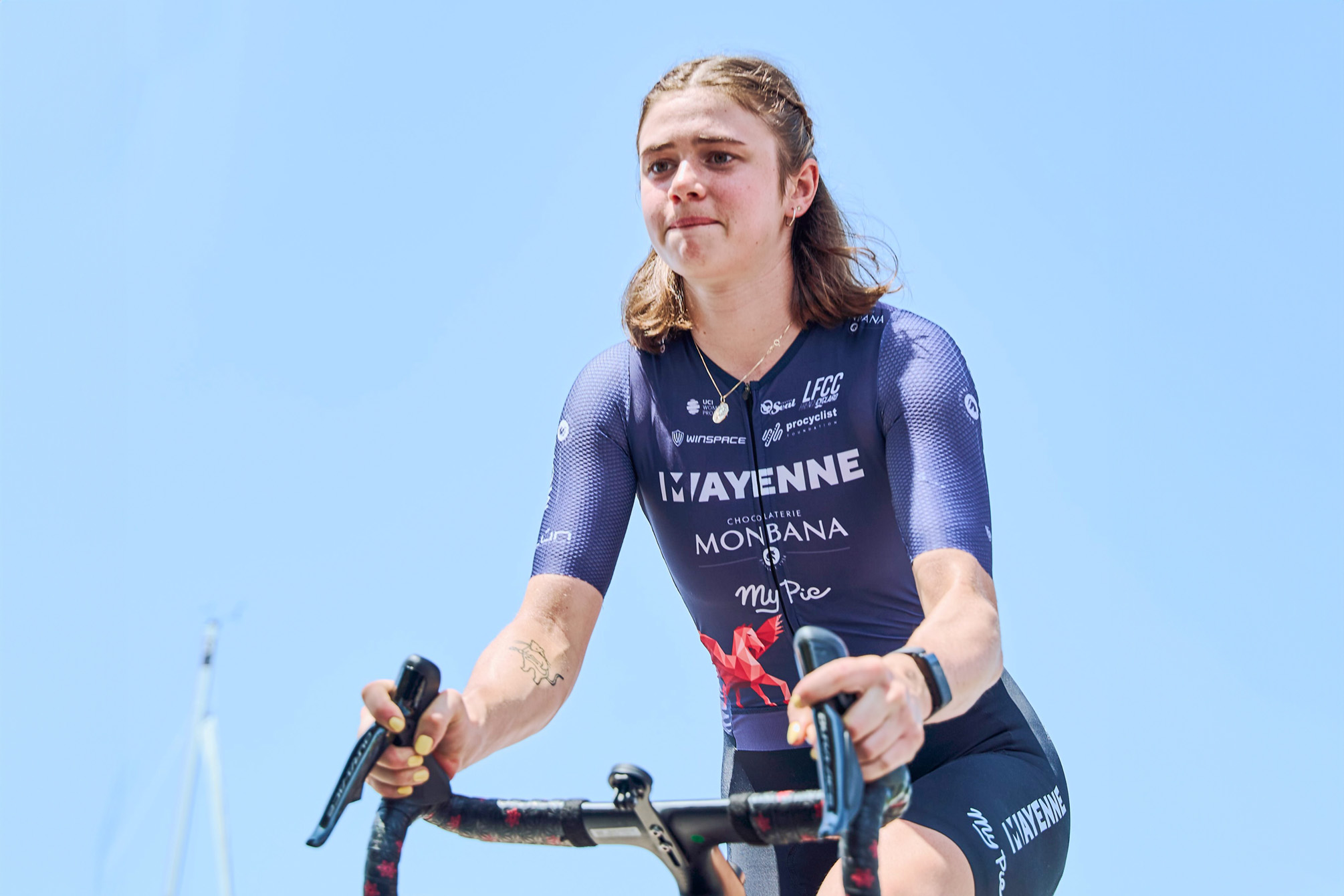 Kiara Lylyk heading to the stage at the start of the opening stage of the 2026 Tour de France Femmes in Lausanne