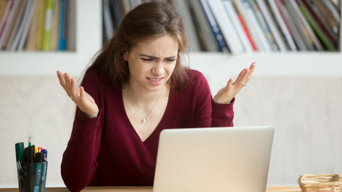 Confused woman looking at a screen