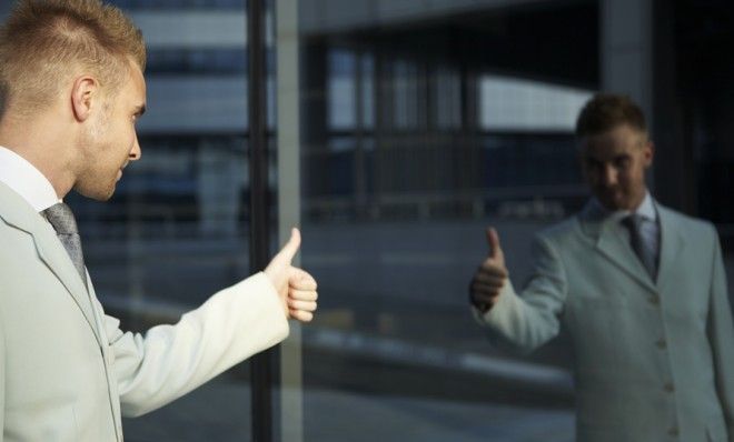 Man looking in mirror