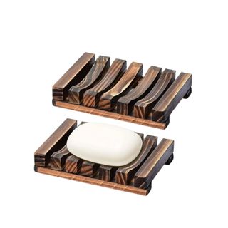 Two wooden soap dishes, one with soap on