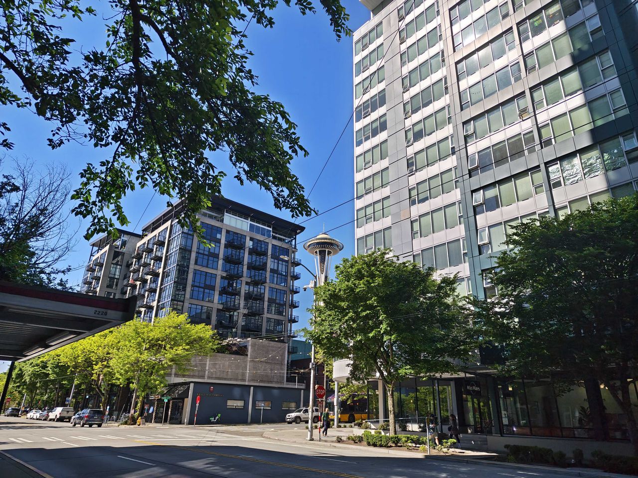 The Seattle Space Needle between two buildings