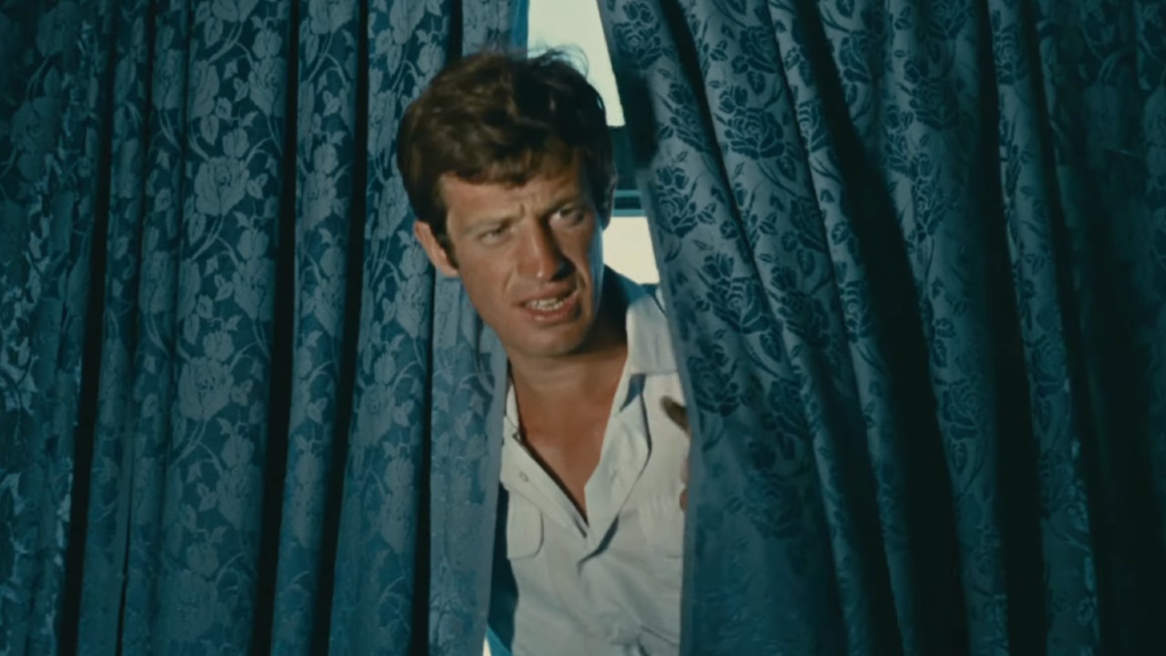 Pvt. Adrien Dufourquet (Jean-Paul Belmondo) look confused in That Man rrom Rio.
