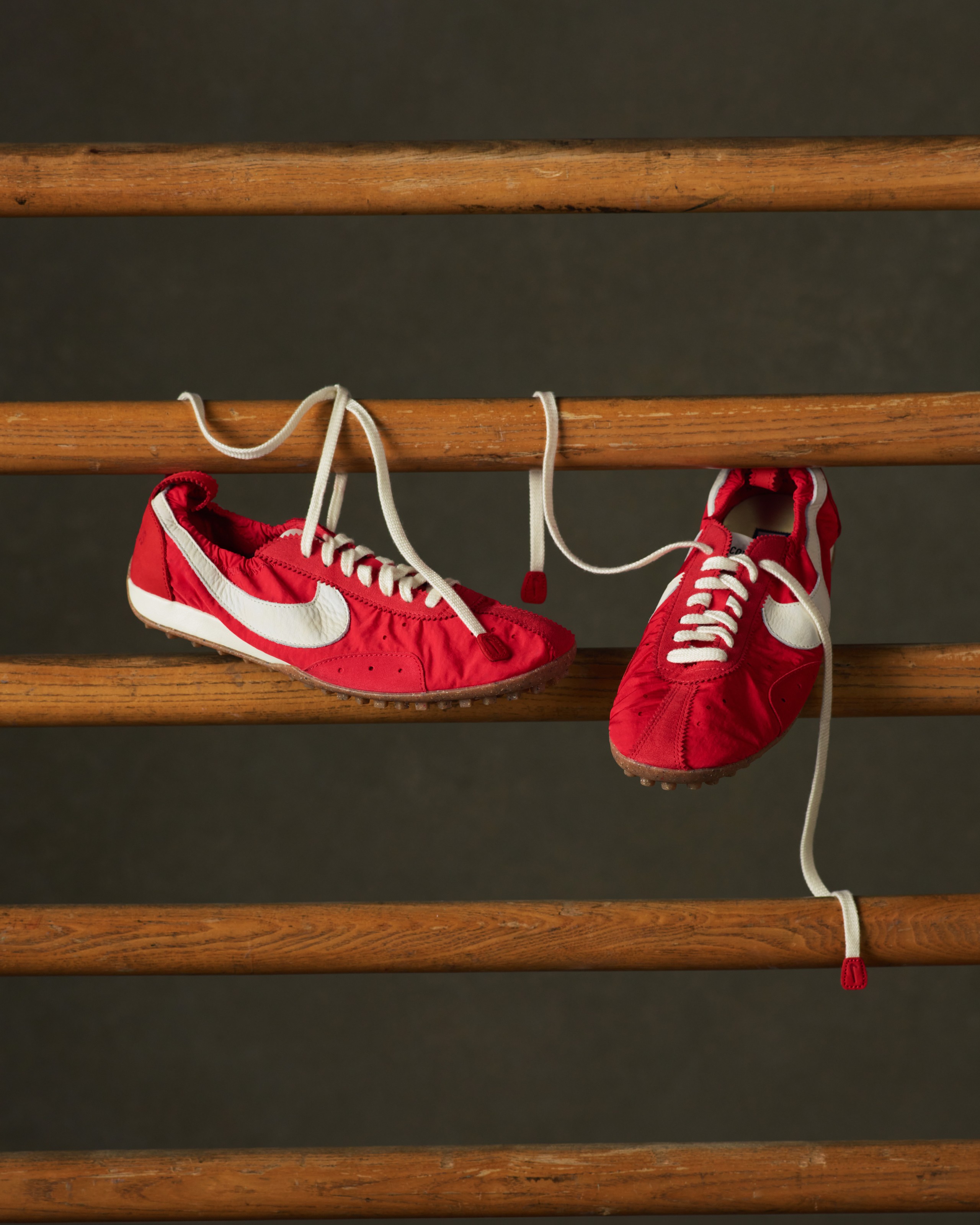 The Nike x Jacquemus Moon Shoe, seen here in a University Red colorway, blends the original model&amp;rsquo;s racing origins with a modern ballet aesthetic to create a contemporary, low-to-the-ground torpedo shoe reflecting both the simplicity of Jacquemus&amp;rsquo; Parisian design philosophy and the dynamism of Nike&amp;rsquo;s sport heritage.