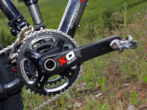The new X.0 crank is built with carbon fiber arms and a separate, bolted-on alloy spider. According to SRAM, the two-piece driveside arm is lighter and stronger than an equivalent one-piece molded part. In fact, sponsored downhill riders will be using this later this year.
