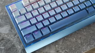 A Redragon Blue Siren K654 wired mechanical keyboard with multi-tone blue keycaps