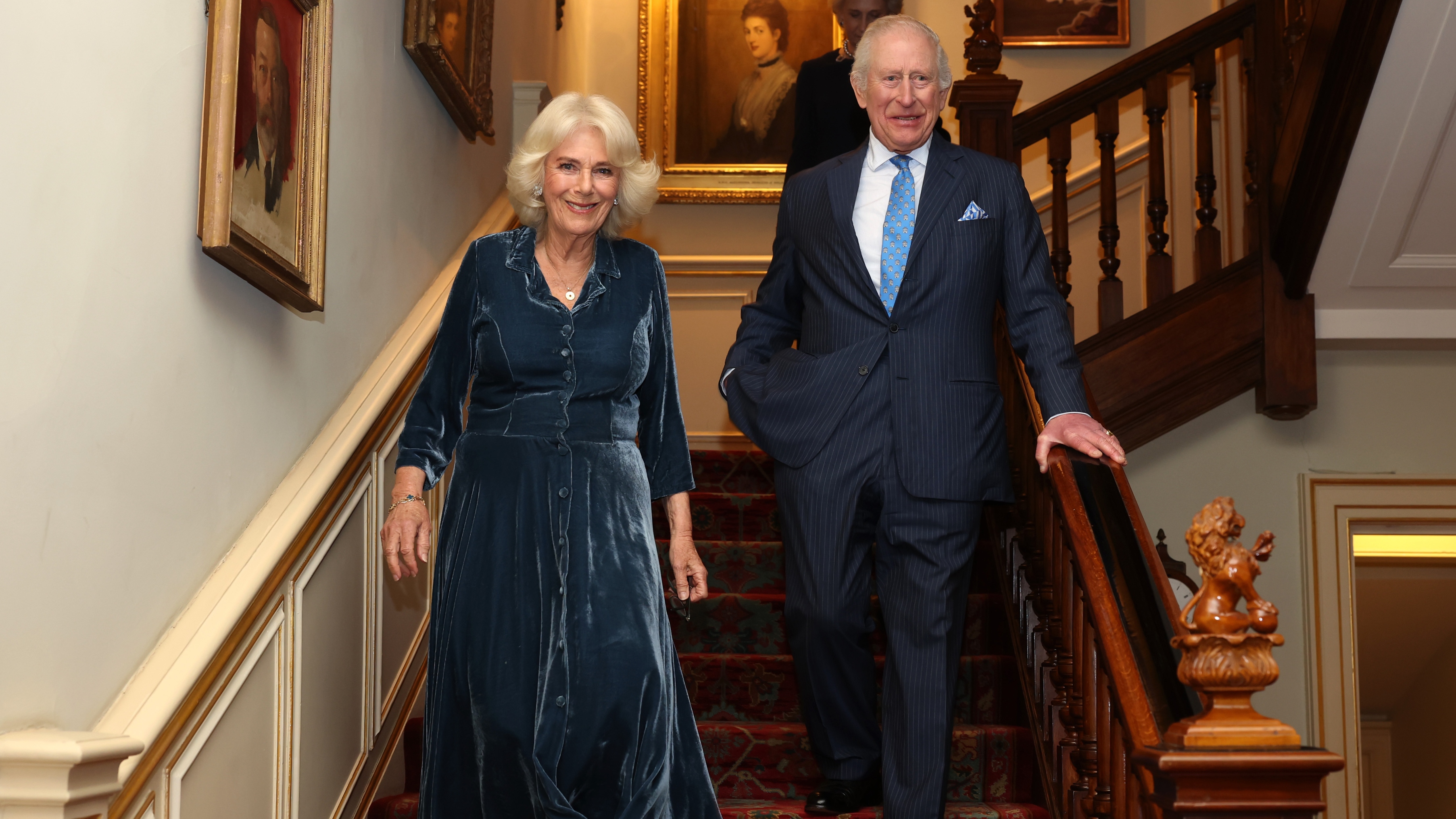 Queen Camilla and King Charles III arrive for a reception to mark the launch of the Queen's reading room medal at Clarence House on March 25, 2025
