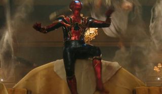Spider-Man: Far From Home Spider-Man watches the bad guys get webbed up in his Iron Spider suit