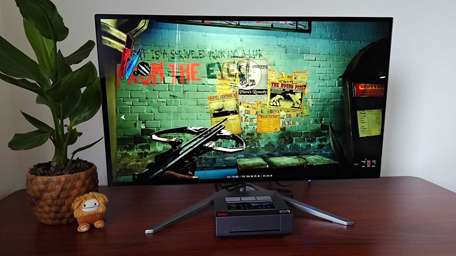 Ayaneo Mini PC AM02 running Dishonored with gameplay on monitor