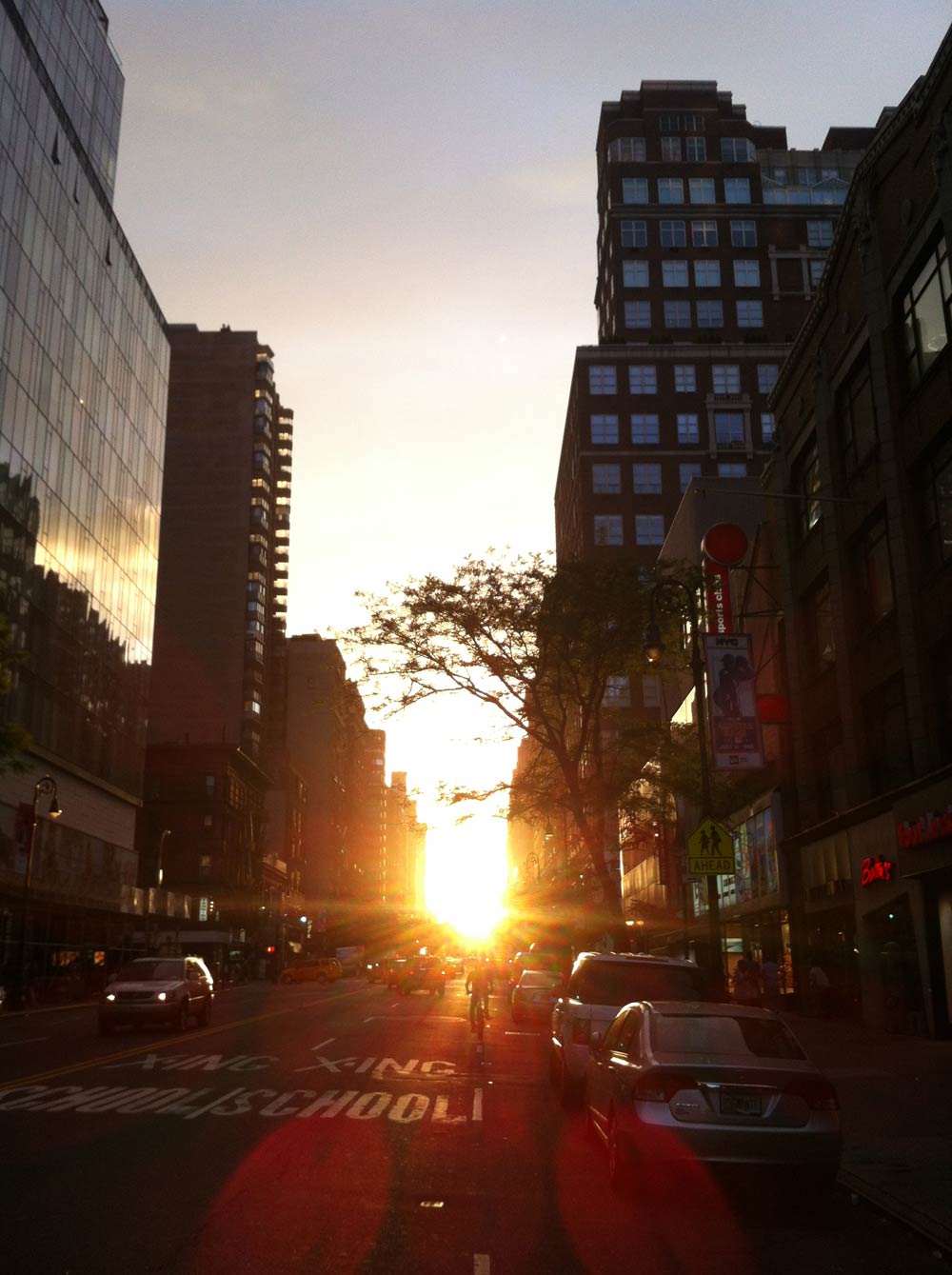 Pics: New Yorkers Chase The Sunset As 'Manhattanhenge' Lights Up City