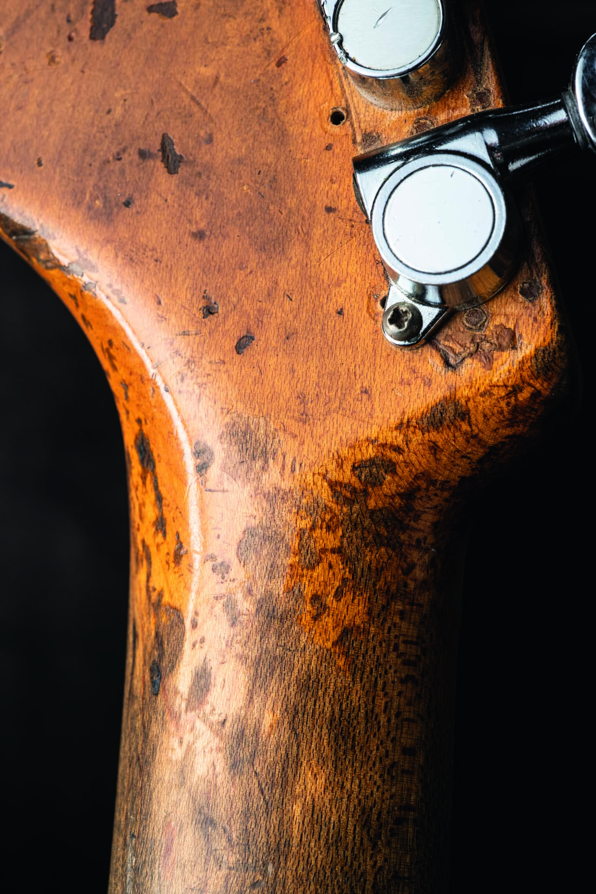 The headstock of Rory Gallagher's 1961 Fender Stratocaster, shot up-close