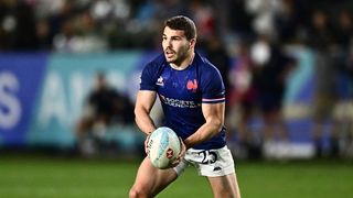 France's Antoine Dupont runs with the ball during the 2024 HSBC Rugby Sevens Los Angeles tournament final men's match between France and Great Britain at Dignity Health Sports Park in Carson, California on March 3, 2024.