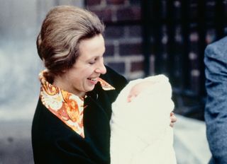 Princess Anne and daughter Zara as a baby outside hospital