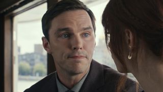 Nicholas Hoult grinning in The Menu. 