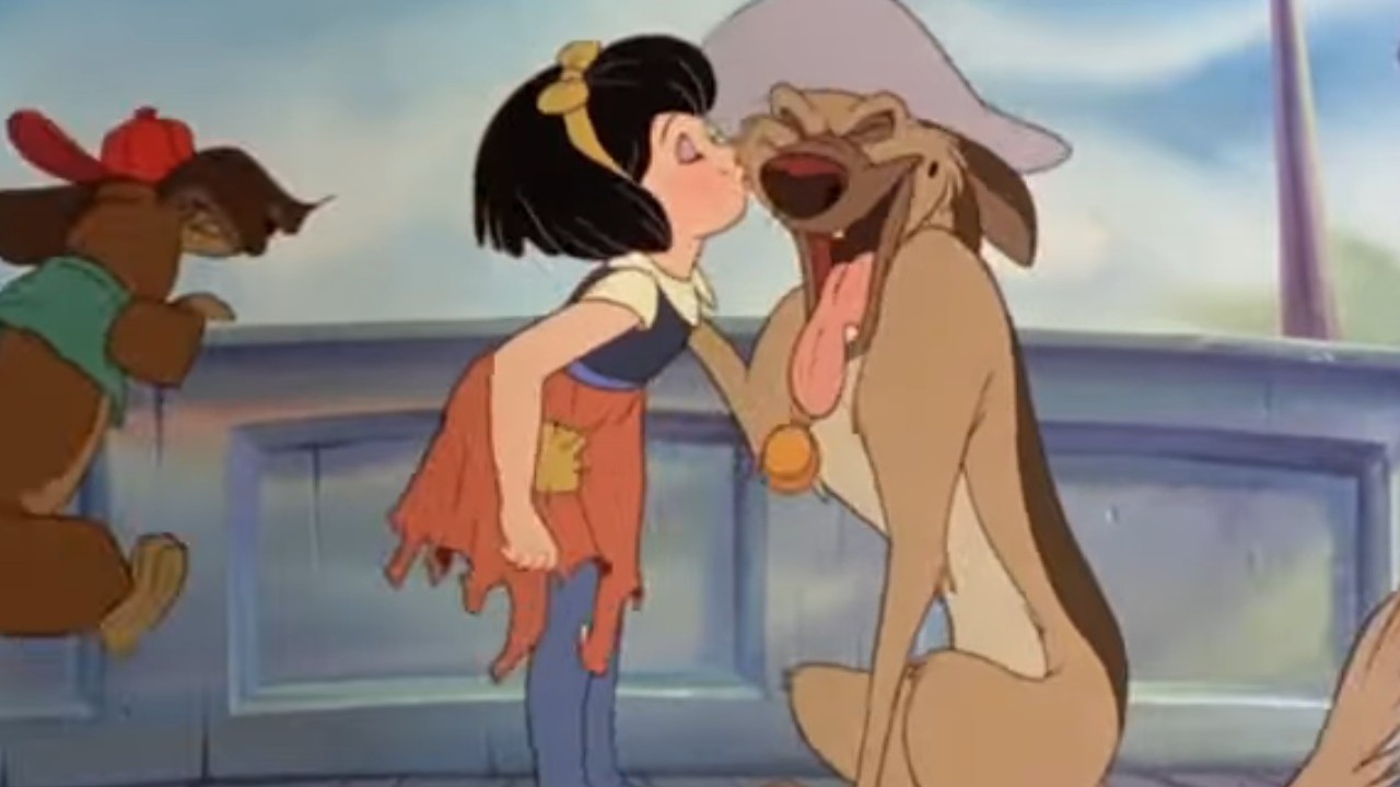 Anne-Marie giving a kiss to Charlie B. Barkin in All Dogs Go to Heaven