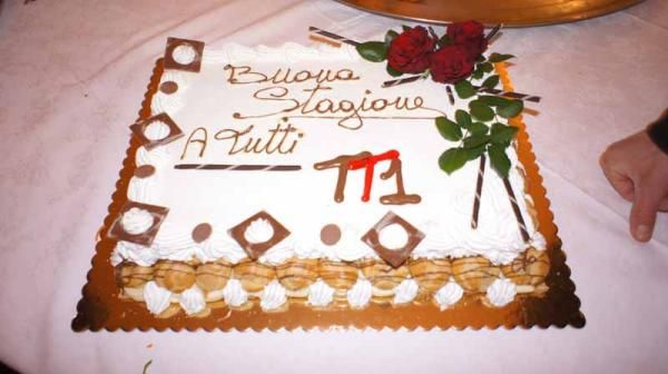 The riders tuck into a pre-season cake