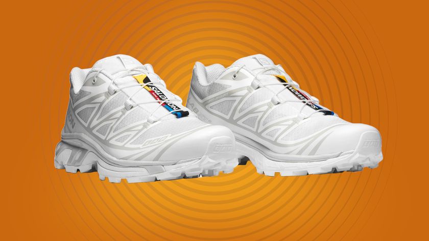 The Salomon XT-6 in white on an orange background