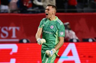 Gabriel Slonina #1 of Chicago Fire reacts after the team win against the Sporting Kansas City at Soldier Field on March 19, 2022 in Chicago, Illinois