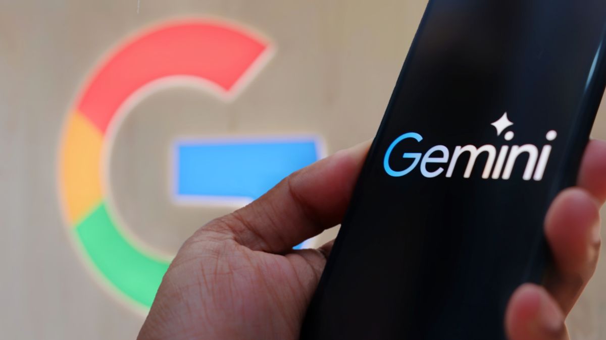 Google Gemini AI logo on a smartphone with Google background