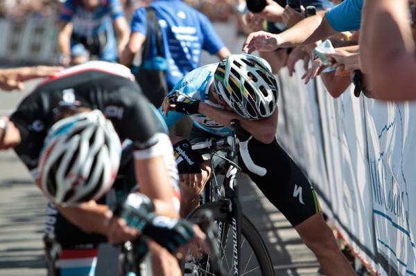 Tejay Van Garderen (HTC-Highroad) gets consoled by fans after a hard day.