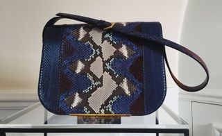 Navy blue snakeskin handbag