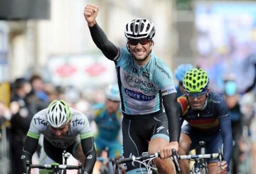 Tom Boonen (Omega Pharma-Quickstep) celebrates a soggy sprint victory in Orleans on stage 2 of Paris-Nice