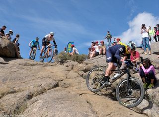 Lance Armstrong handled the slickrock drop with ease.