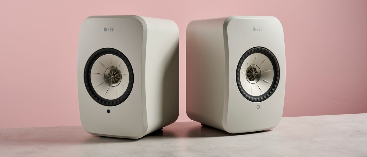 The KEF LSX II LT speaker against a pink background