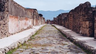A well-preserved paved Roman road in Pompeii, Italy.
