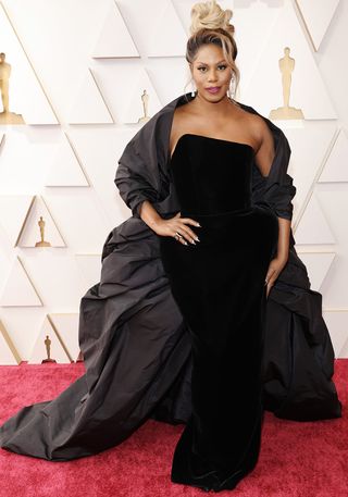 oscars 2022 best dressed stars include Laverne Cox in black velvet dress and opera coat