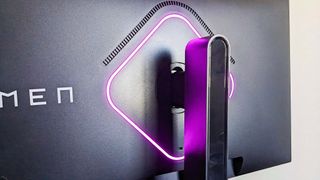 HP OMEN 27k Gaming Monitor with purple RGB lighting.