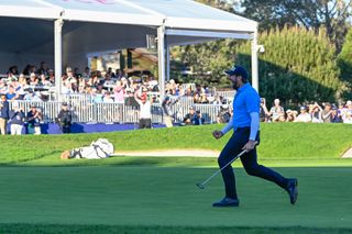 Matthieu Pavon celebrates holing the winning putt at the 2024 Farmers Insurance Open