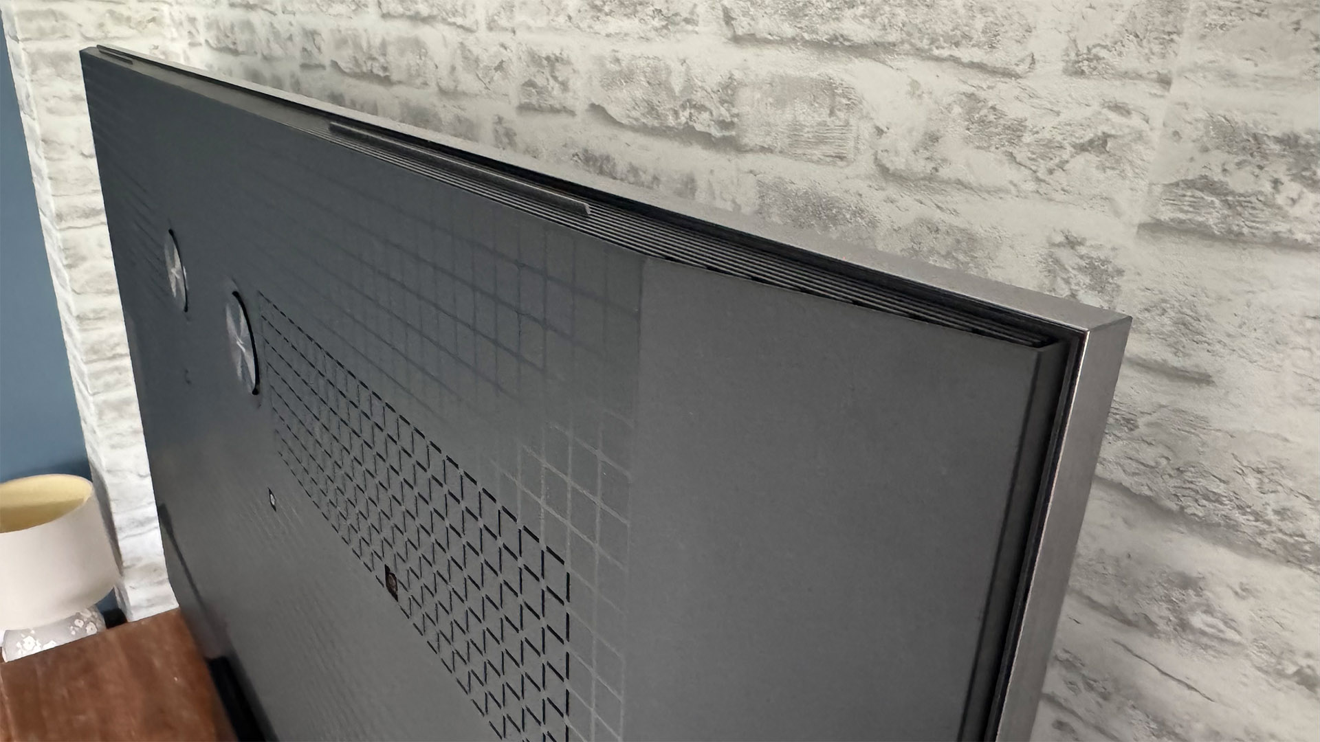 The 65-inch TCL C7K Mini LED TV photographed in a living room