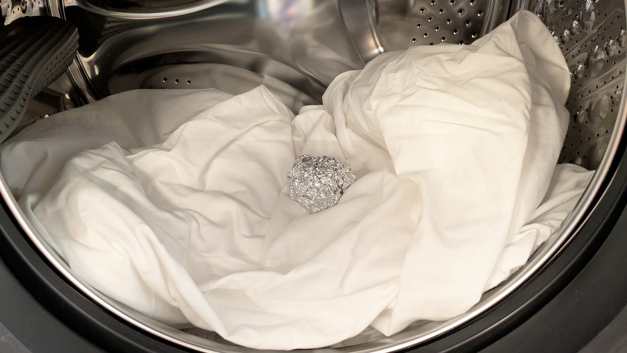 Ball of aluminum foil in washing machine