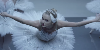 Taylor Swift in a ballerina outfit bowing in Shake it Off music video