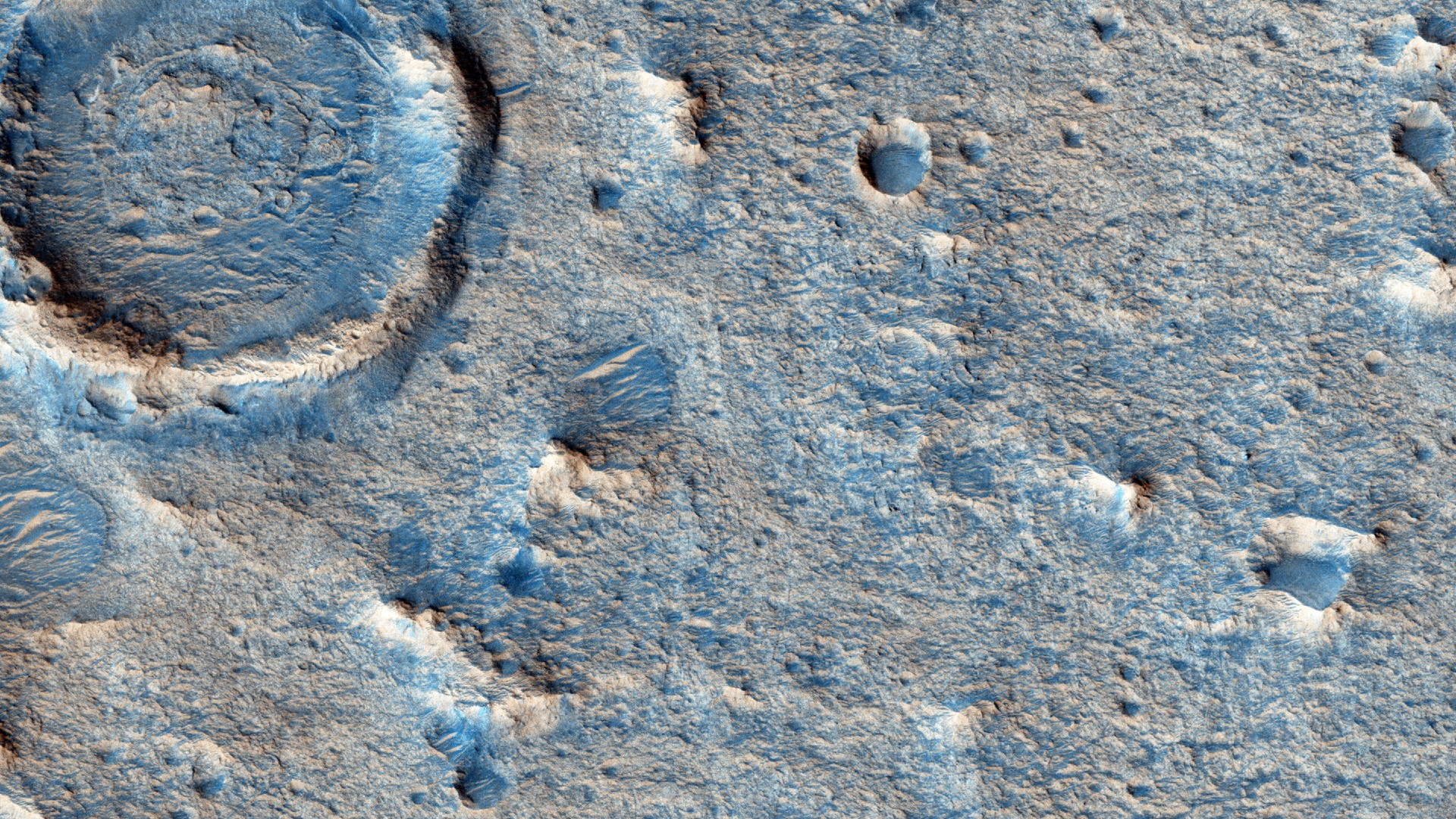 a topographical map of a section of mars containing several large craters and many small craters