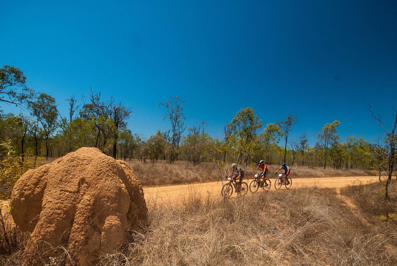 The lead group with Nissen, Huber and Johnston on a wide and open Outback road.