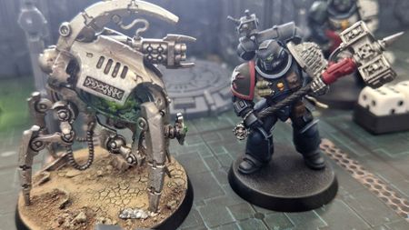 Deathwatch and Necron models face off on the Kill Team: Tomb World battlefield