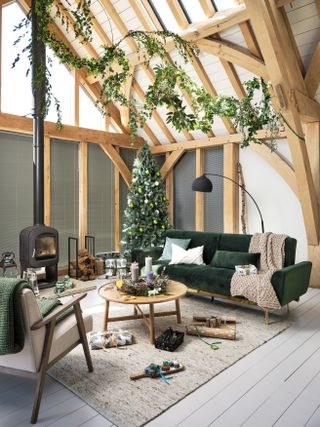 Christmas living room with green foliage by Wayfair