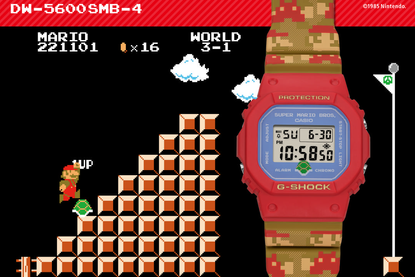 An image of the Casio G-Shock x Super Mario Bros watch, on top of a scene from the iconic Super Mario Bros game