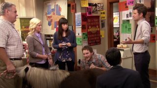 The Parks and Recreation gang with Li'l Sebastian
