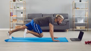 Man doing mountain climbers