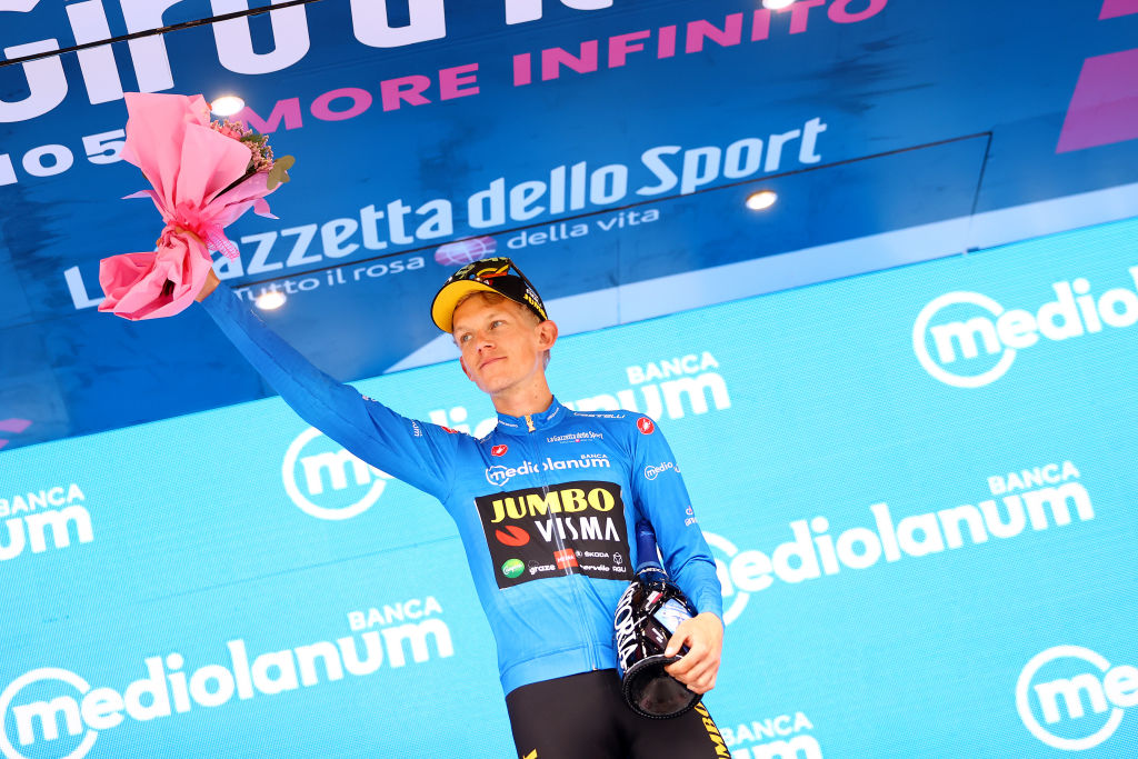 TREVISO ITALY MAY 26 Koen Bouwman of Netherlands and Team Jumbo Visma celebrates winning the blue mountain jersey on the podium ceremony after the 105th Giro dItalia 2022 Stage 18 a 156km stage from Borgo Valsugana to Treviso Giro WorldTour on May 26 2022 in Treviso Italy Photo by Michael SteeleGetty Images