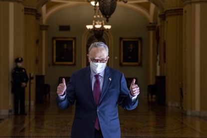 Chuck Schumer gives a thumbs up