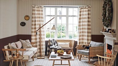 scandi living room with wood panelling and festive decor