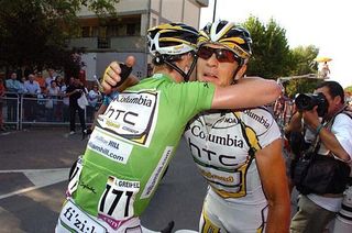 Germany's Andr&eacute; Greipel (Columbia-HTC) hugs his teammate.