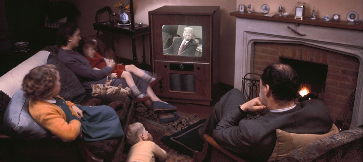 A family watching TV.